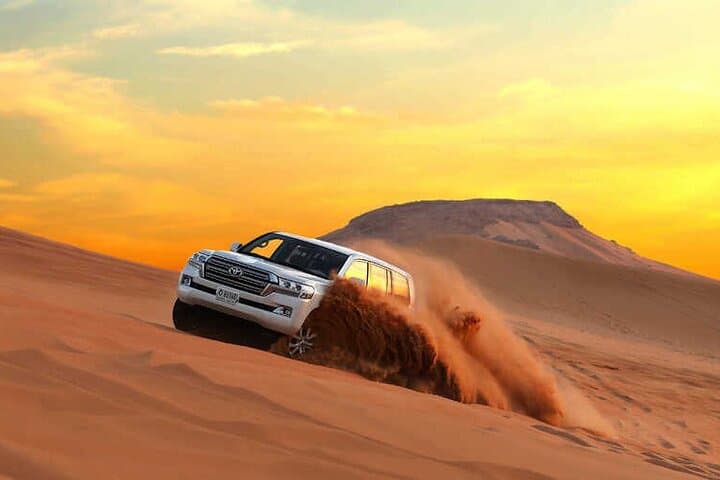Morning Red Dunes Safari: Quad Biking, Sandboarding & Camel Ride