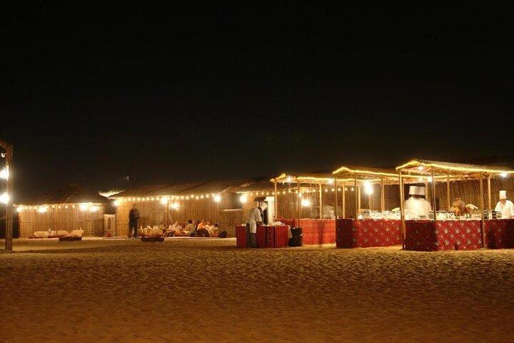 One hour Quad Bike at Red Sand Desert Safari with Camel Ride and BBQ Dinner