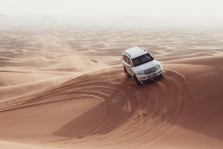 Dubia 4x4 Dune Bashing, Sandboarding, Camel Riding and Bbq Dinner