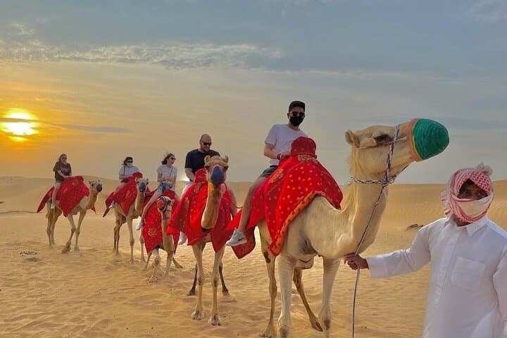 Morning Desert Safari in Dubai with Camel Ride and Sandboarding