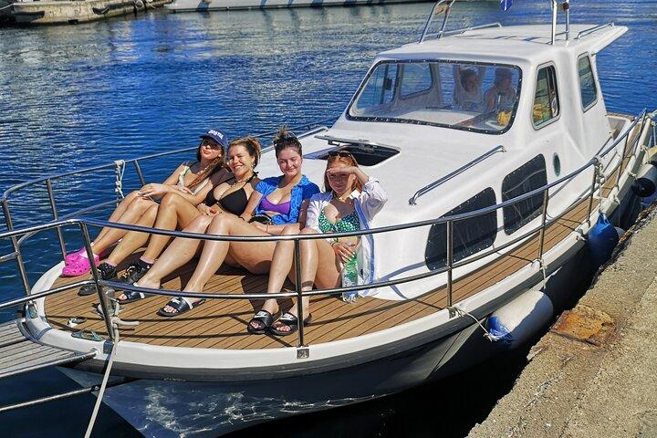 Visit 2 Islands of Zadar on a traditional wooden boat during half-day trip