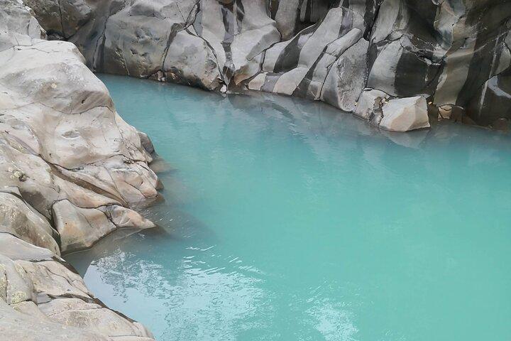 Rio Celeste river waterfall, hike and hot springs tour from San Jose, Costa Rica