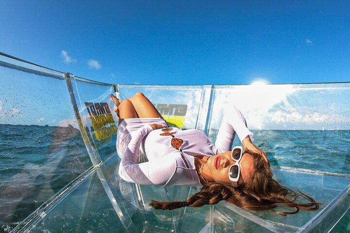 Excursion to Reefs in a transparent boat from Cancun