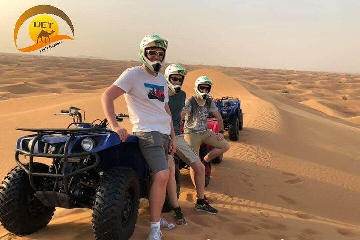 Dubai Desert Safari with Quad Bike, sandboarding, live show & BBQ