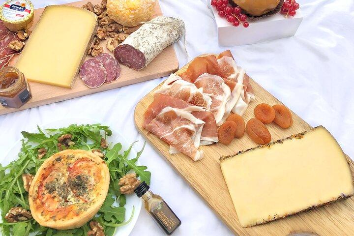 Experience a Decadent French Picnic with Wine Pairing in Paris