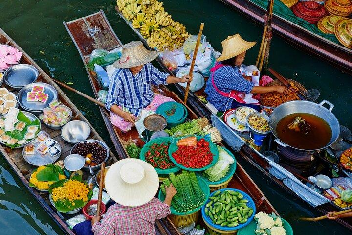 Explore Thailand’s Floating Market with Paddle Boat Adventure
