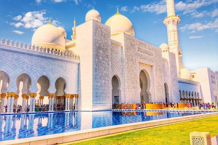 Sheikh Zayed Grand Mosque with Ferrari World from Dubai