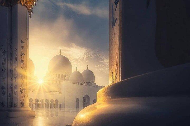 Sheikh Zayed Grand Mosque with Ferrari World from Dubai