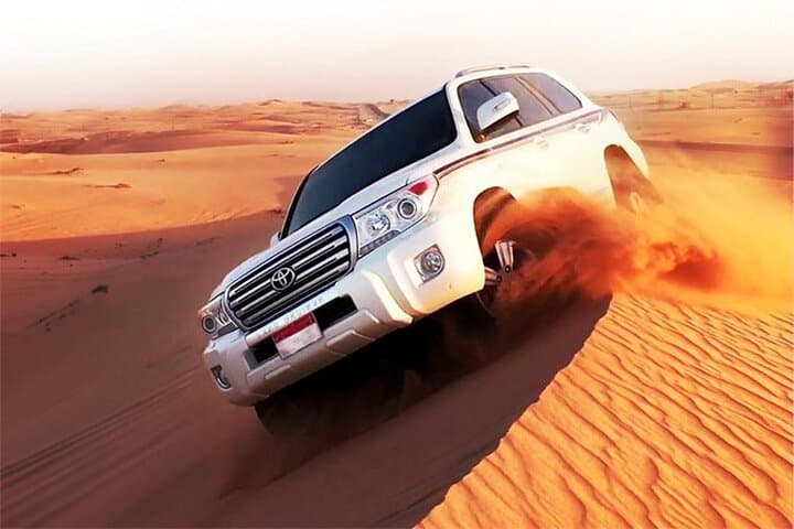 6-Hour Dubai Desert Dinner Safari with Dune Bashing & Camel Ride