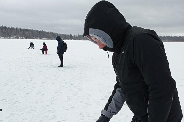 Ice fishing experience with Backpacker Helsinki Tour