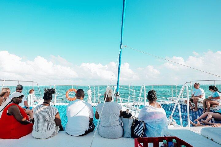 Enjoy the Sunset in Catamaran Unlimited - Sailing to Isla Mujeres from Cancún