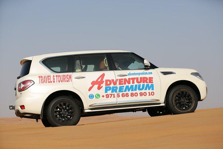 Dubai Desert Safari with Quad Bike, Dune Bashing, Camel Ride, Sand Boarding &BBQ