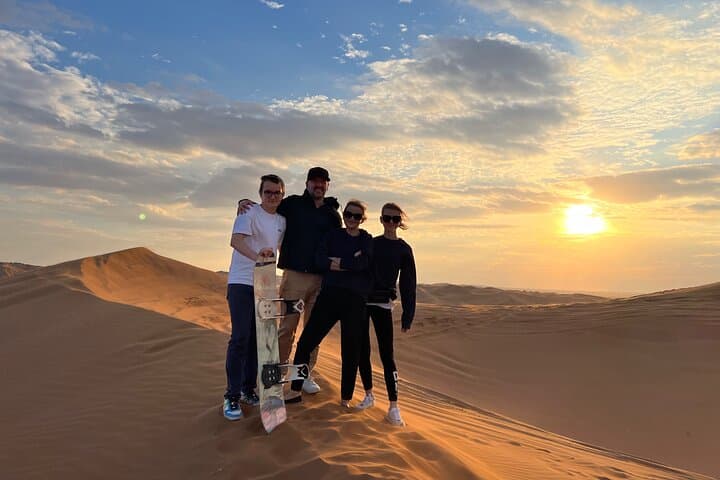Sunset Safari with BBQ Dune Drive Camel Ride & Dune Buggy option
