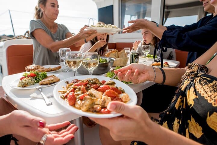 Sail the Athenian Coastline on a Catamaran with Meal & Wine