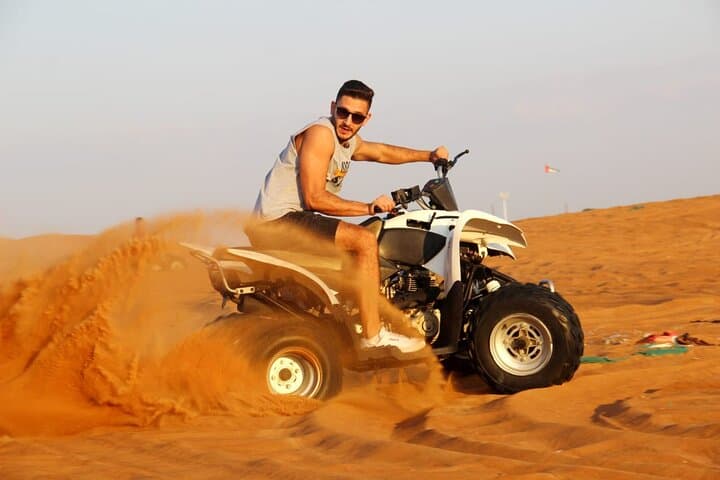 Morning Desert safari With Quad bike ride Sandboard & Camel ride