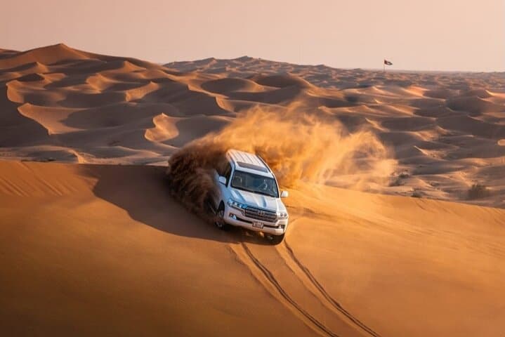 Dubai Desert Safari with Camel Ride, Sand surf, & BBQ Dinner
