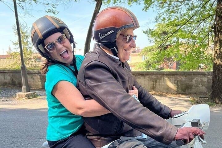 Ride Rome on a Vespa with a local driver