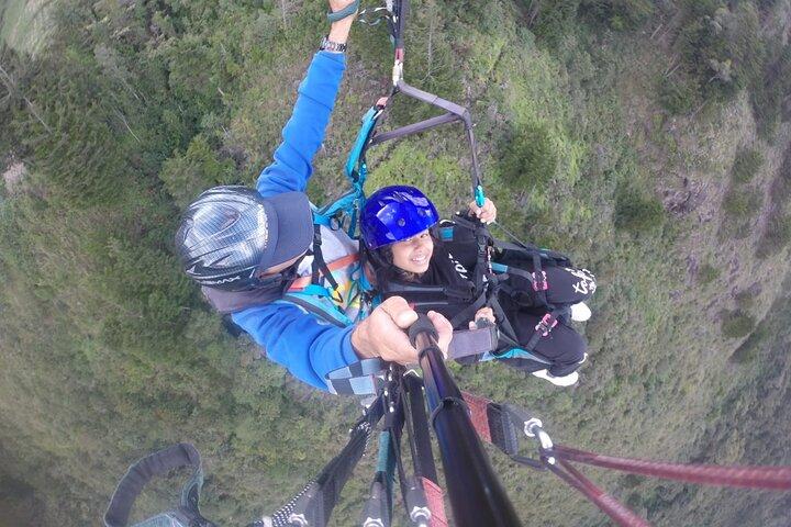 Go Paragliding in Medellín with private transporter service