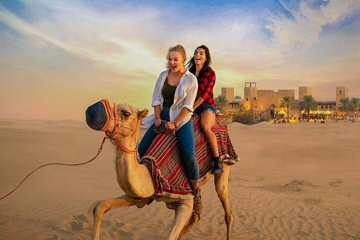 Dubai: Desert Safari With Quad Bike, Camel Ride & Dinner