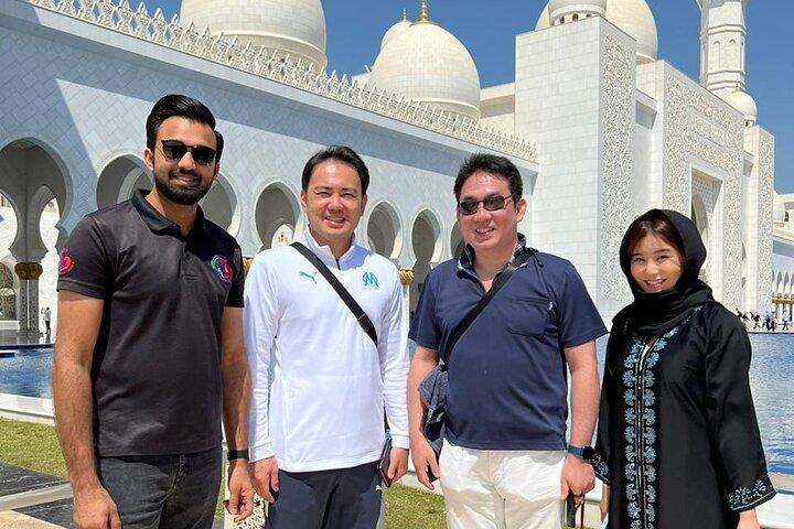 Sheikh Zayed Grand Mosque with Ferrari World from Dubai