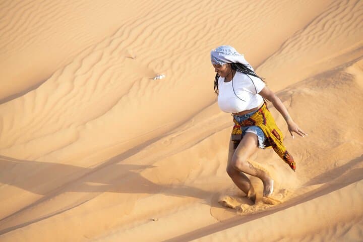 Dubai Half-day Red Dunes bashing with Sandboarding, Camel &Falcon