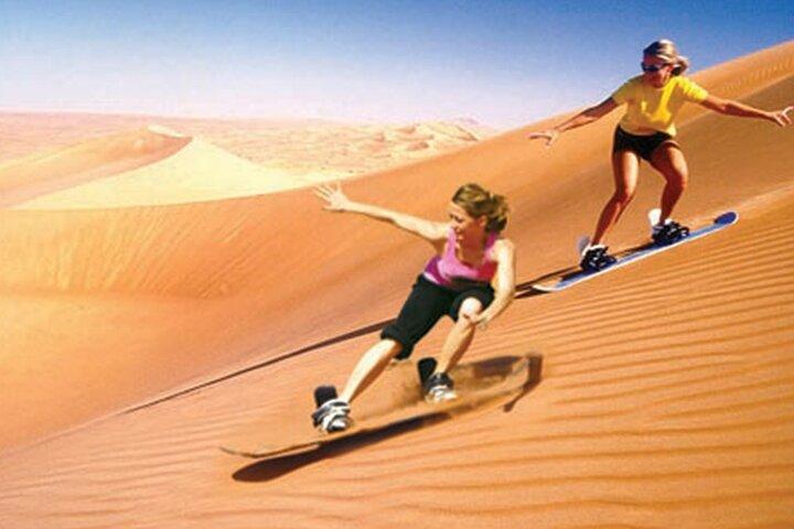 Sunrise Desert Safari with Quad Biking and Camel Riding in Dubai