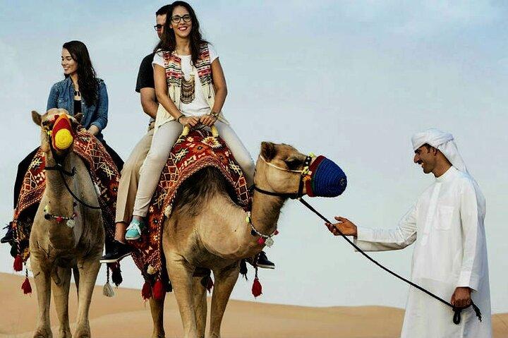 Sunrise Desert Safari with Quad Biking and Camel Riding in Dubai