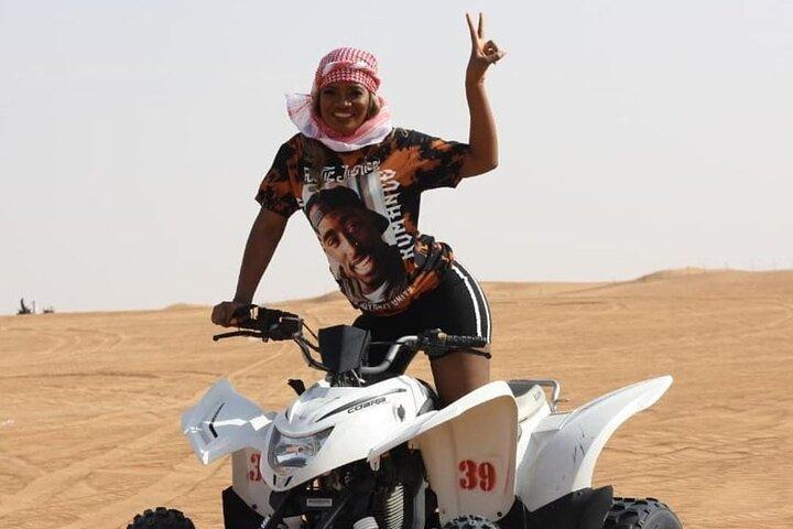 Dubai Desert Safari with Quad Bike, Camel Ride, Sandboard and BBQ