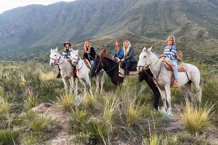 Horseback riding at sunset