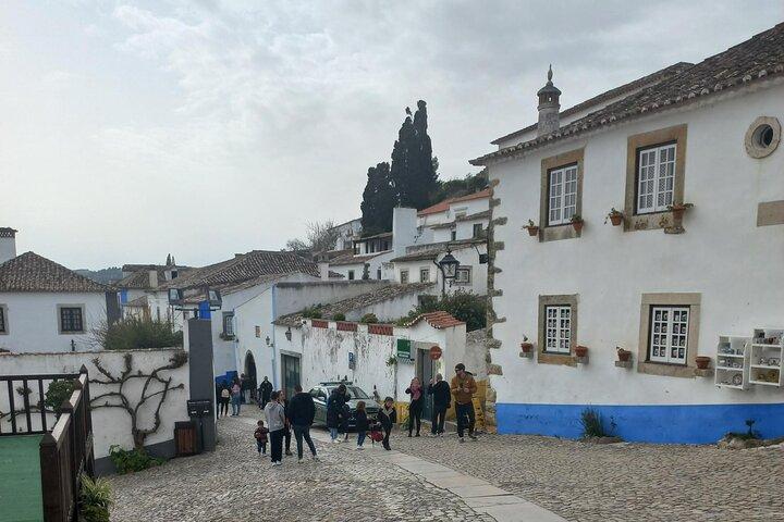 Transfer to Porto with Óbidos and Nazaré