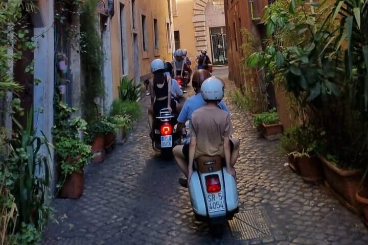 Ride Rome on a Vespa with a local driver