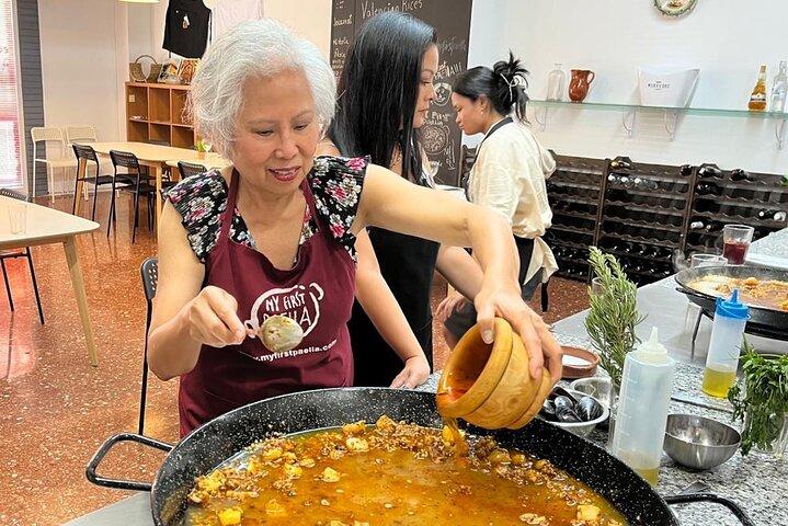 Seafood Paella cooking class Sangria workshop & Local Market