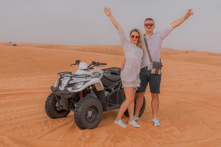 Morning Desert safari With Quad bike ride Sandboard & Camel ride