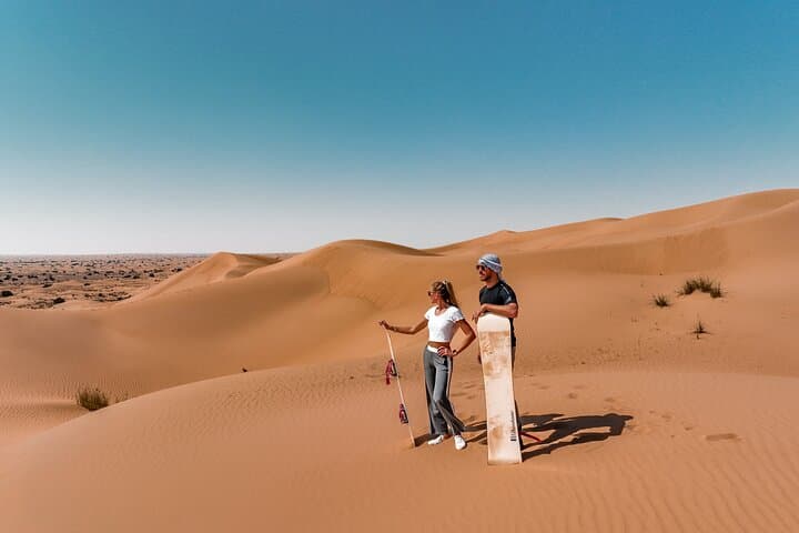 Dubai Evening Desert Safari: Sandboarding, BBQ, Camel Ride & more