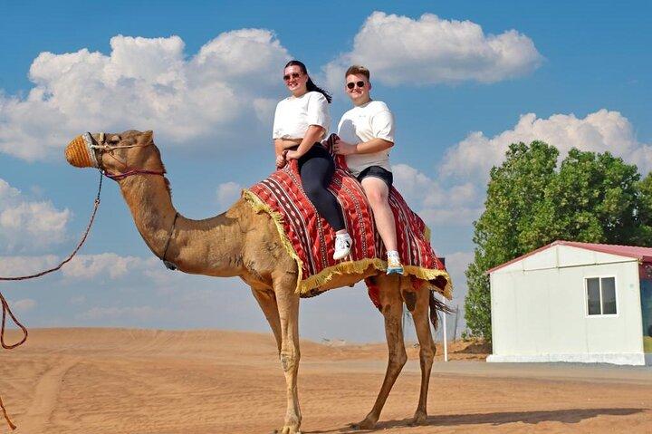 Morning Desert Safari Quad-bike camel ride Sand Surfing in Dubai