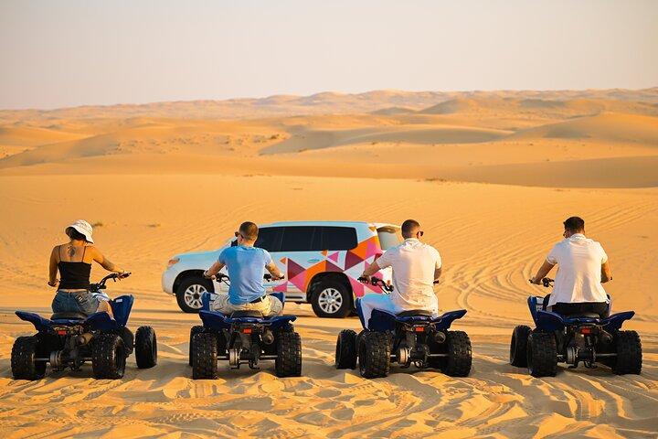Abu Dhabi Evening Desert Safari - Dune bashing Camel ride and BBQ