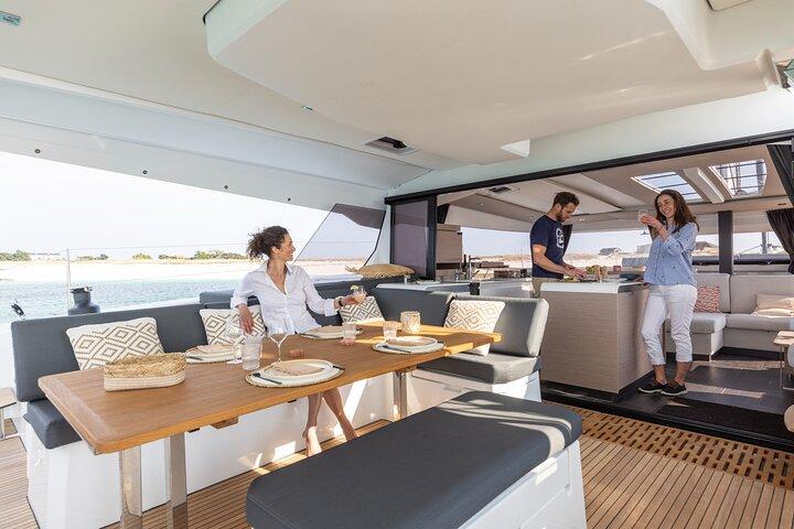 Mykonos: Brand-New Catamaran Cruise with Meal, Drinks & Transport
