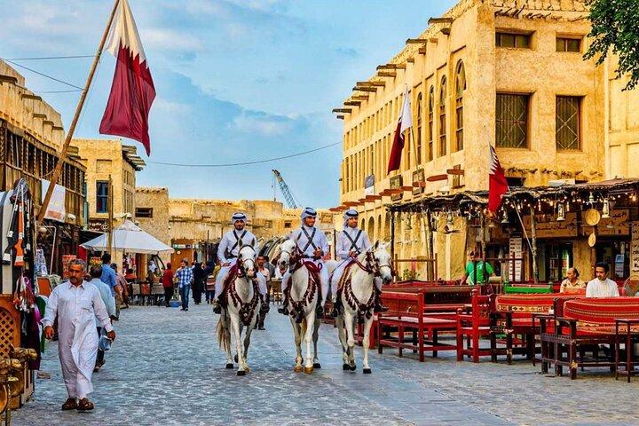 City Tour & Desert Safari with Camel Ride and Sand-boarding