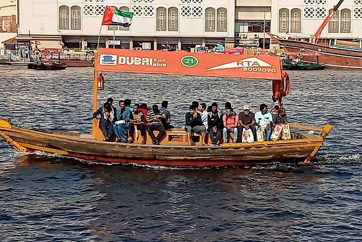 Old Dubai Walking Tour with Local/souks, boat, and local tasting.