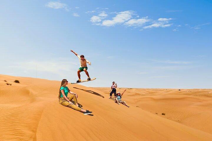 Dubai Desert Safari in Red Dunes with 4×4 BBQ Dinner & Camel Ride