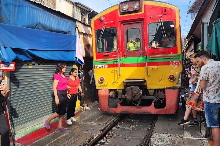 Private Maeklong Railway Market and Amphawa Floating Market Tour.
