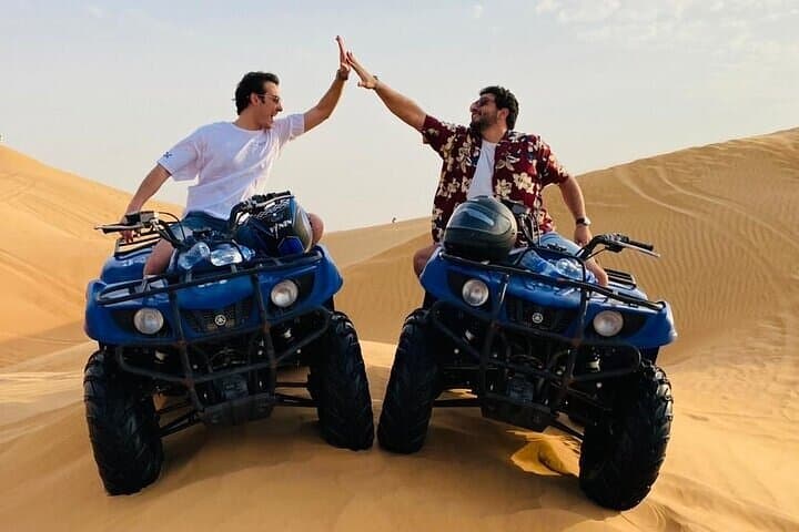 Morning Desert Safari with Quad Bike & Camel Ride & Sandboarding
