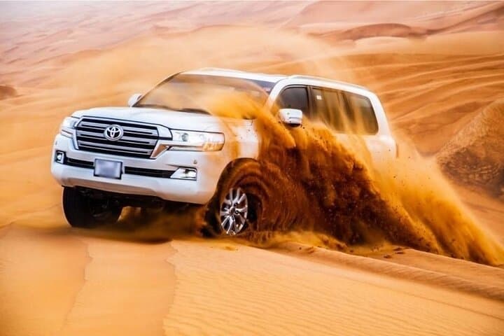 Premium Desert Safari: BBQ, Quad Bike & Sandboarding