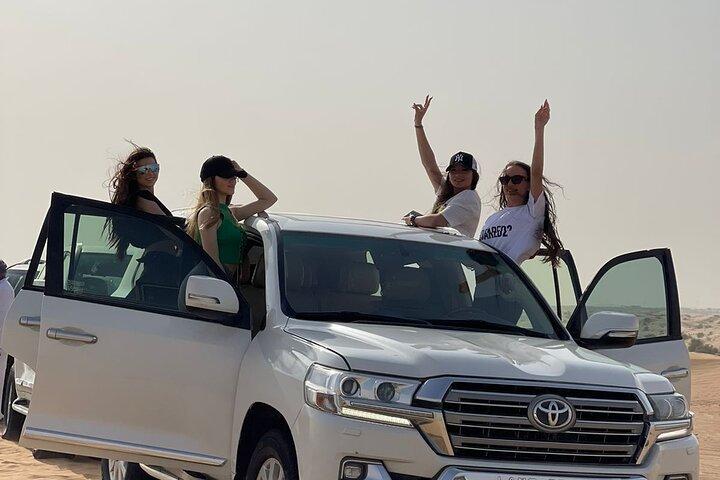 Dubai Red Dune Desert Safari with Camel Ride & BBQ Dinner