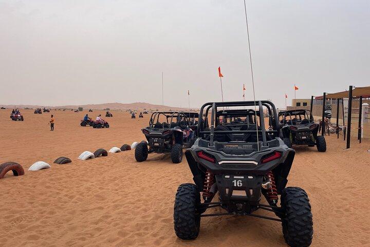 Red Dune Desert Safari Camel Ride, Sandboarding with BBQ Dinner