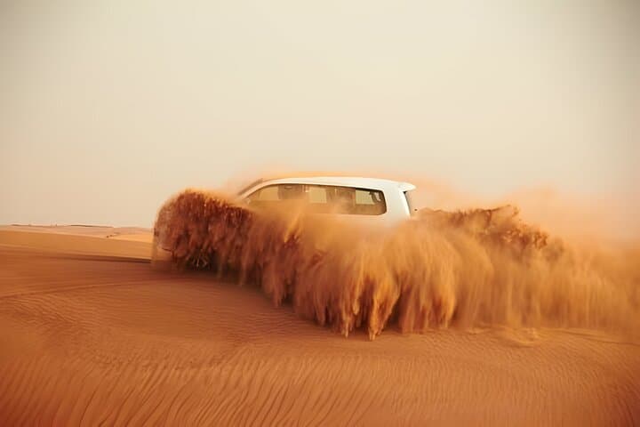 Dubai Red Dune Desert Safari: Camel Ride, Sandboarding & BBQ