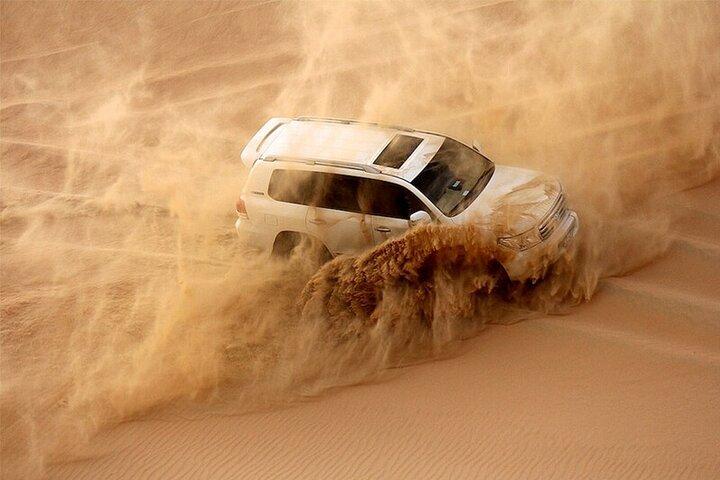 Private Sunrise Desert Safari with Camel Ride and Sand Boarding
