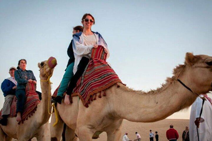 Private Sunrise Desert Safari with Camel Ride and Sand Boarding