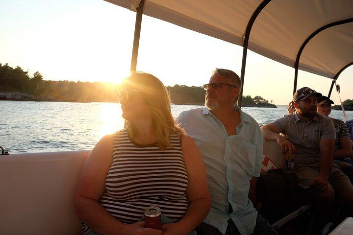 Small Group Sunset Lighthouse Boat Cruise With Local Drinks