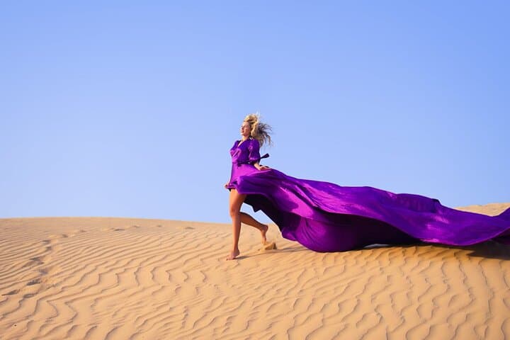 Flying Dress Photography in Desert Dunes of Dubai With Transfers